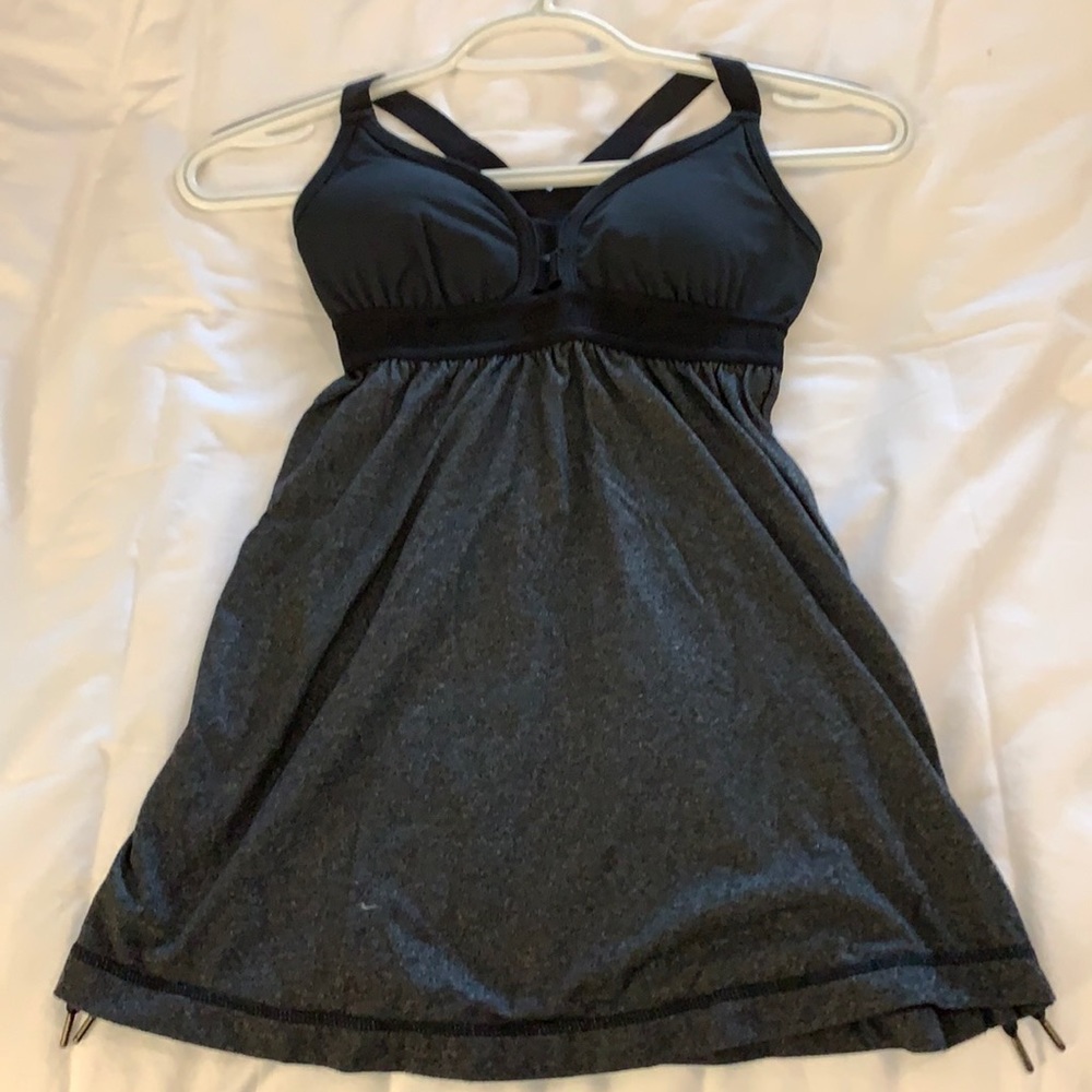 Lululemon black and charcoal strappy tank. NWOT. Size 4. Excellent condition.